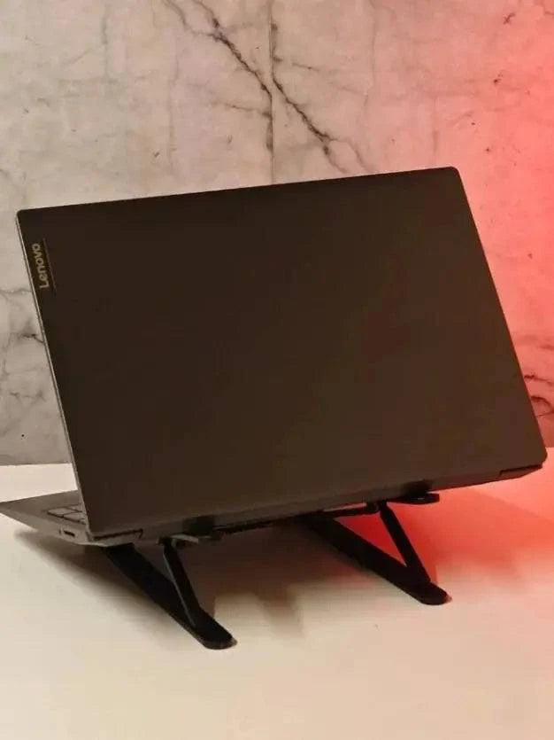 Lenovo IdeaV15 laptop with AMD Ryzen 5 2500U processor, silver body, open display showing keyboard and screen.