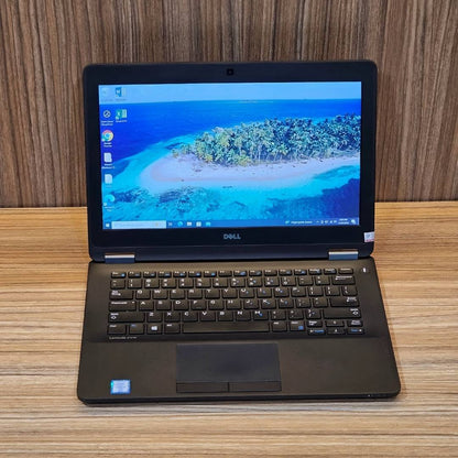 Dell Latitude E7270 business laptop with 8GB RAM and 256GB SSD, shown with external wireless adapter.
