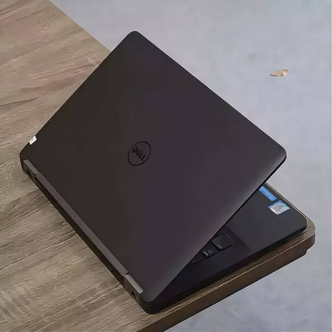 Dell Latitude E7270 portable business laptop with 8GB RAM and 256GB SSD, shown with external wireless adapter.