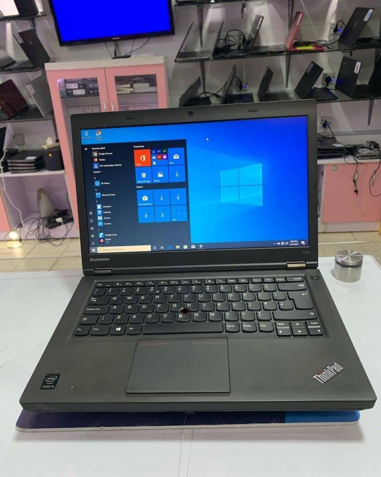 Lenovo Thinkpad T440P business laptop with black keyboard and screen, featuring a silver-gray body and ports on the sides.
