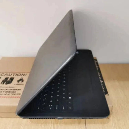 HP 250 G5 Notebook PC with black keyboard and screen displaying a desktop background, viewed from a slight angle.
