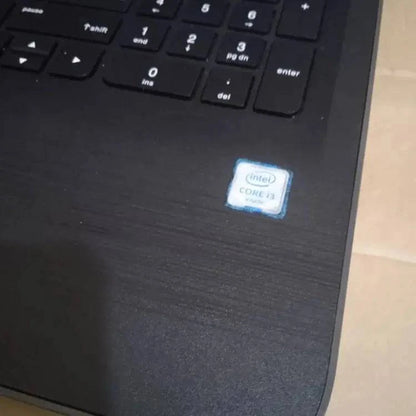 HP 250 G5 Notebook PC by SariQart with open screen showing keyboard and touchpad, portable and lightweight design.